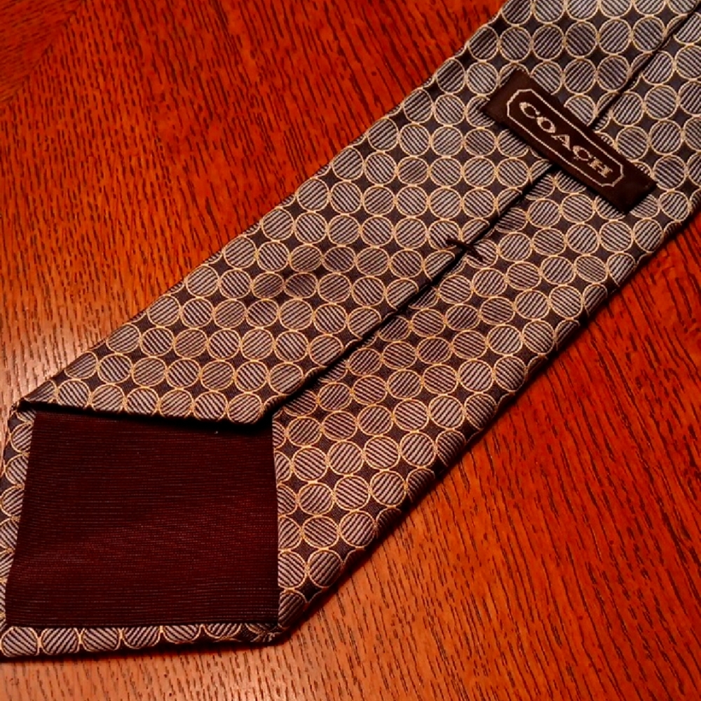 Coach Tie, Great Condition. Beautiful.made In USA. Browns and Greys.